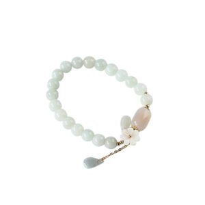 703070f4-54c8-4c53-b62f-1501e5eb9e38.jpg Shell flower jade water drop bracelet