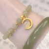 f562c1f6-3cd8-42d1-b39e-885638fc8d1e.jpg Chinese Style Jade Rabbit Bracelet