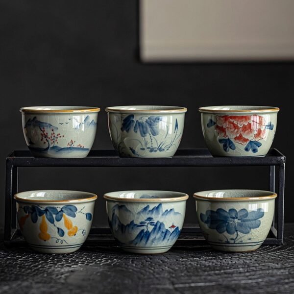36a44437-ce0f-4595-86df-e1f90a004316_trans.jpeg Pure Hand-Painted Fish Play Lotus Feng Shui Tank | Jingdezhen Chai Kiln Tea Cup